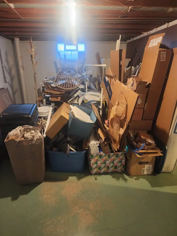 Roll-off dumpster container at job site for 15 Yard Dumpster Rental in Thomaston